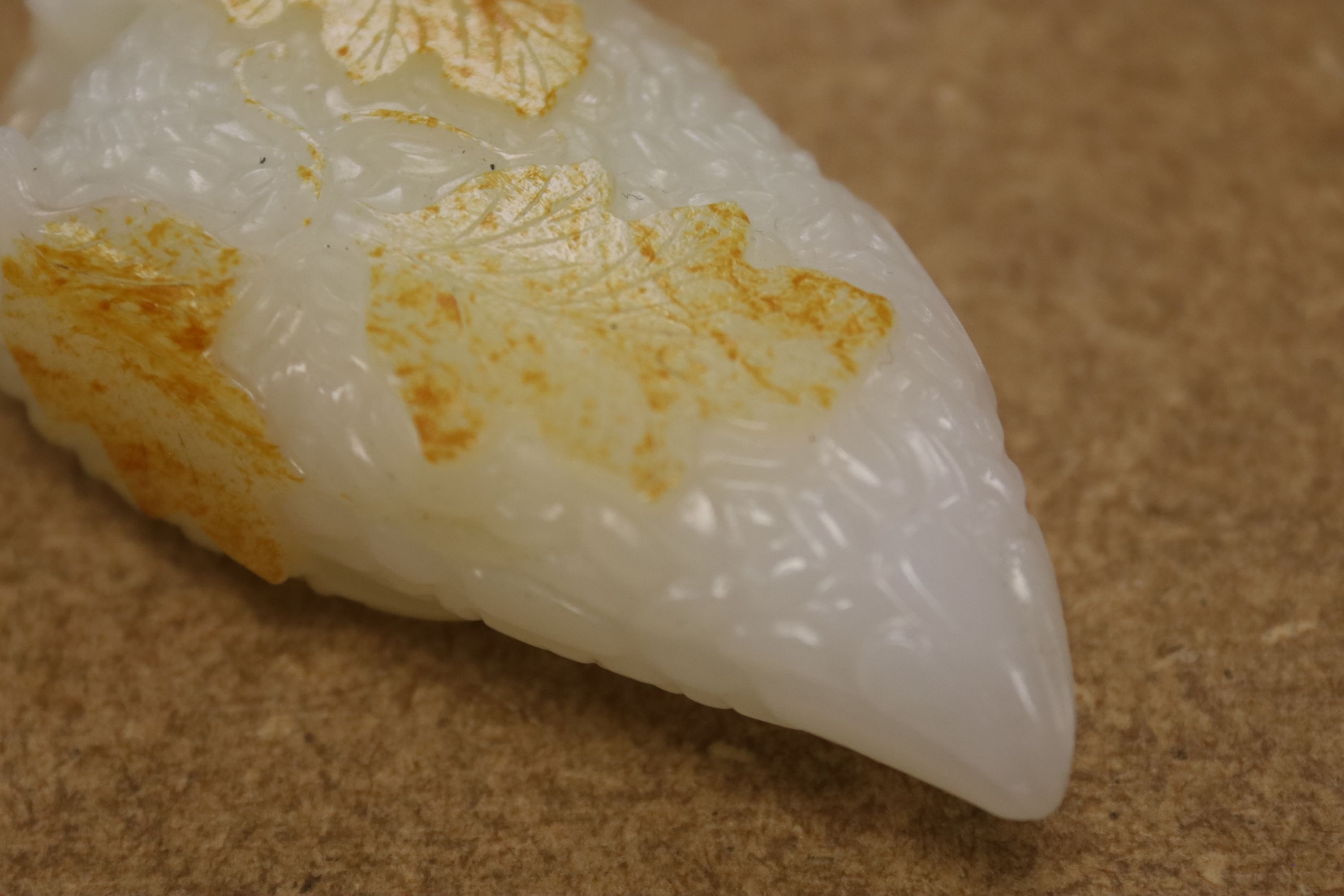 A Chinese white and russet skin jade carving, 7cm high